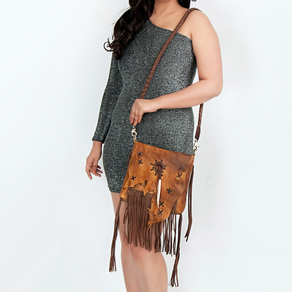 LC-ADBGM282A Raw-Edge Tribal Leather Crossbody - Fringe, Bone Accent & Braided Strap