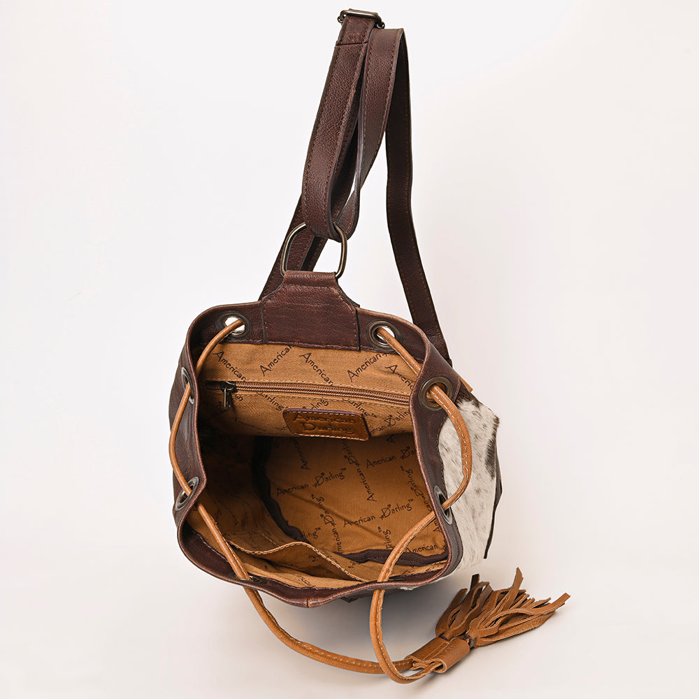 ADBG1324 Western Patchwork Leather & Cowhide Drawstring Backpack with Tooled Accent