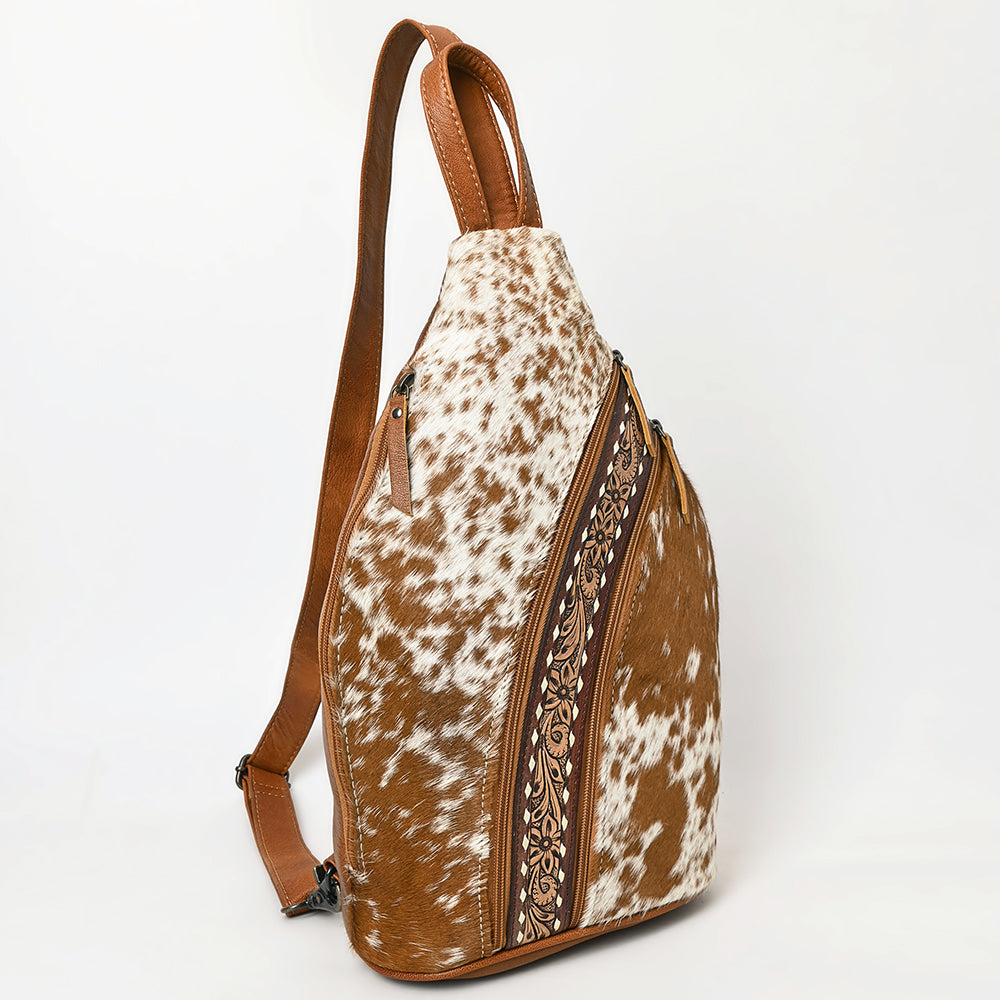 ADBG1513 Hair-On Cowhide Sling Backpack with Hand Tooled Leather Accents