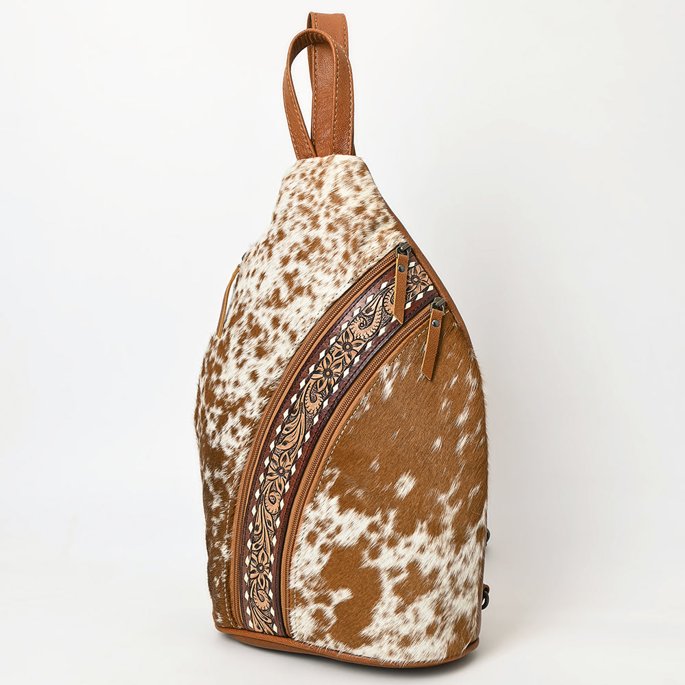 ADBG1513 Hair-On Cowhide Sling Backpack with Hand Tooled Leather Accents