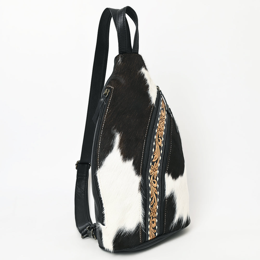 ADBG1514 Black & White Cowhide Sling Backpack with Tooled Leather Accents