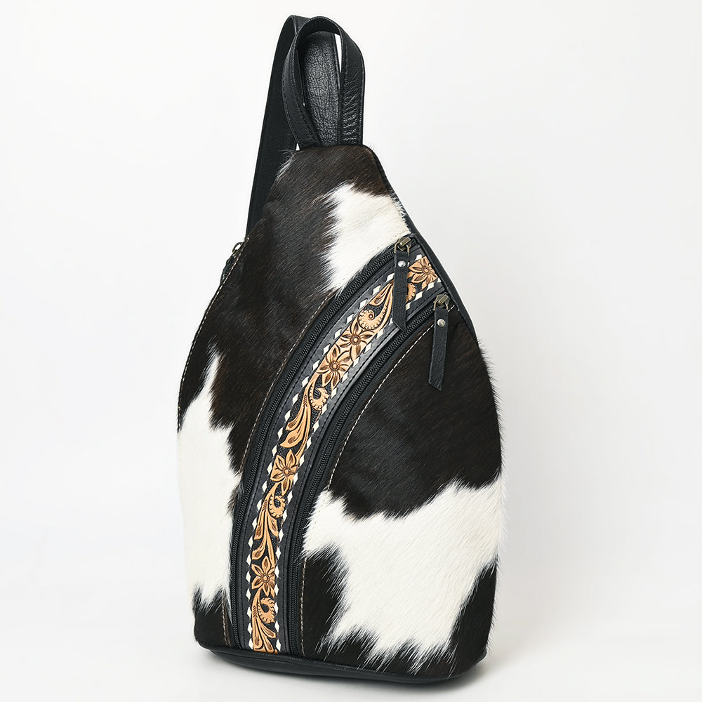 ADBG1514 Black & White Cowhide Sling Backpack with Tooled Leather Accents