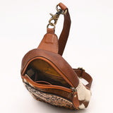 ADBGA652 Floral Tooled Leather & Cowhide Sling Backpack with Teardrop Panel Design