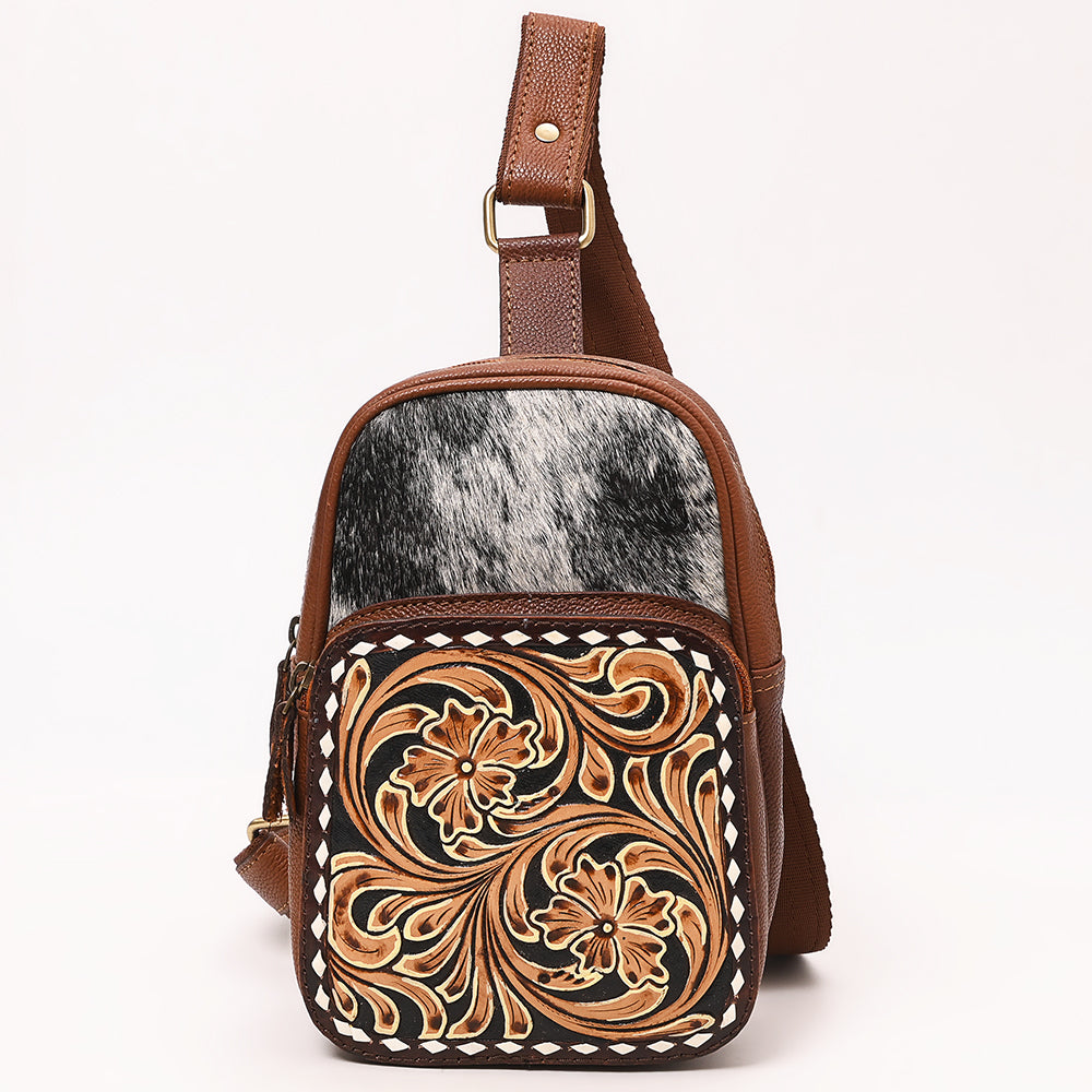 ADBGA654 Tooled Leather & Cowhide Sling Bag with Floral Front Pocket and Whipstitch Trim