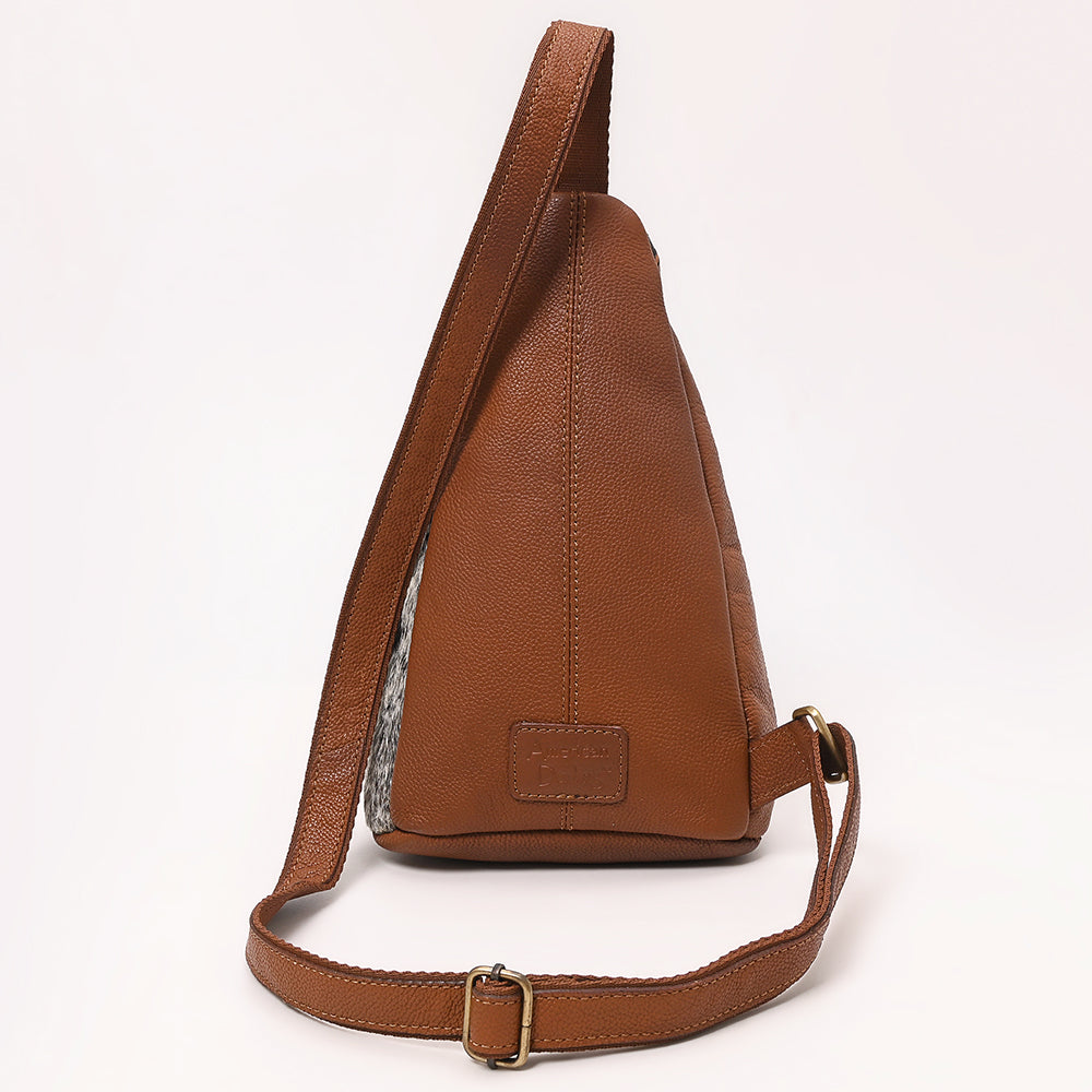 ADBGA655 Tri-Color Cowhide Sling Backpack with Tooled Leather Floral Pocket & Western Yoke