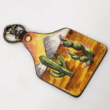 ADKRM135 Hand-Painted Leather Keyring � Sunset Desert Cactus Scene