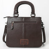 Quilted brown leather crossbody bag with hand-tooled floral leather accent, braided top handles, and adjustable shoulder strap
