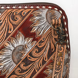 Tooled leather crossbody bag with silver sunflower carvings and matching tooled shoulder strap

