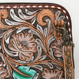 Hand-tooled leather crossbody bag with floral carving, turquoise accents, and tooled strap

