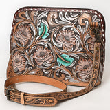 Hand-tooled leather crossbody bag with floral carving, turquoise accents, and tooled strap

