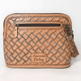 Tooled leather crossbody bag with pink floral carvings, silver scroll accents, and matching tooled leather strap

