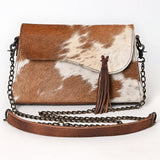 Genuine cowhide leather crossbody bag with brown and white tri-color pattern, fringe tassel, and antique brass chain strap

