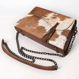 Genuine cowhide leather crossbody bag with brown and white tri-color pattern, fringe tassel, and antique brass chain strap

